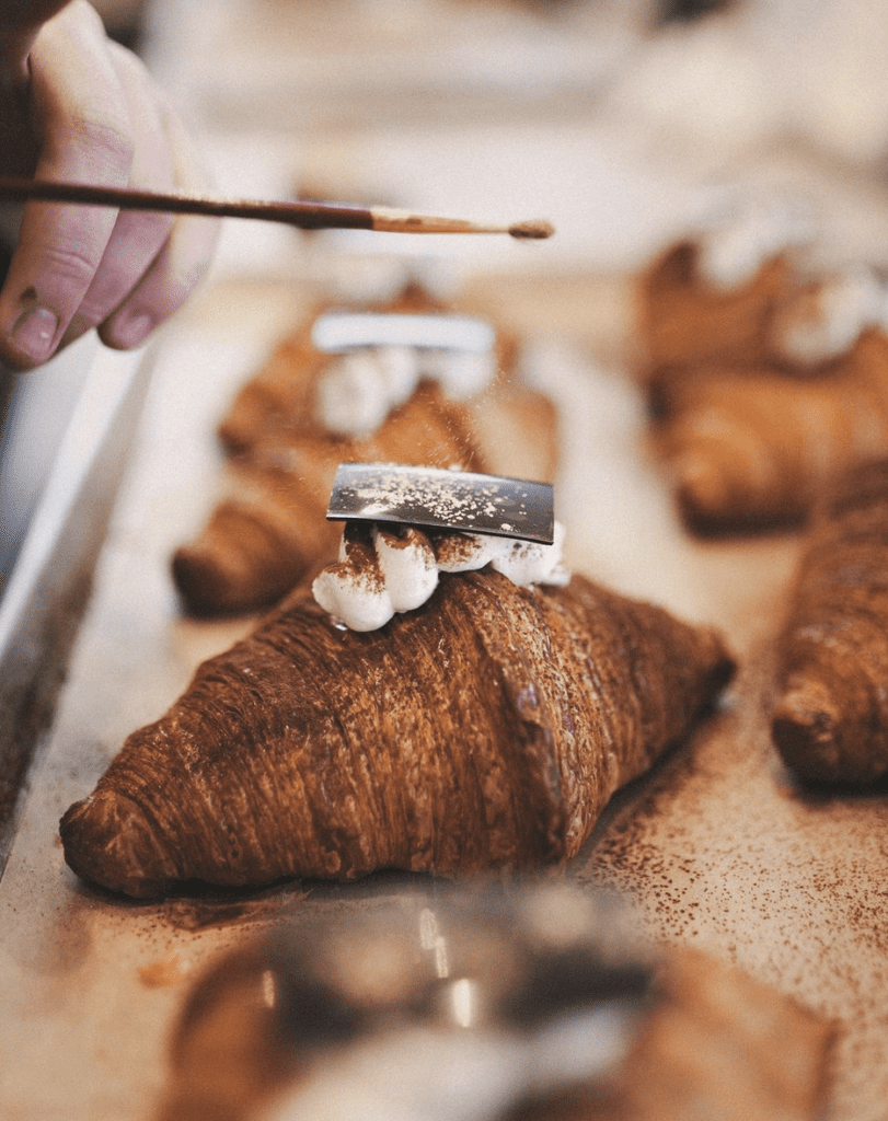 A close up of a smores croissant from Nemesis Coffee in Vancouver.