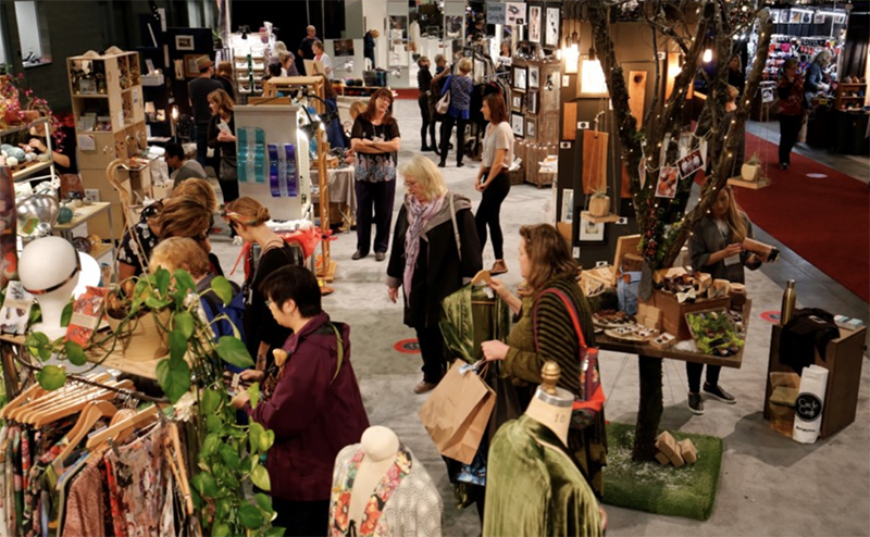 A photo from abouve of shopper at the Circle craft fair.