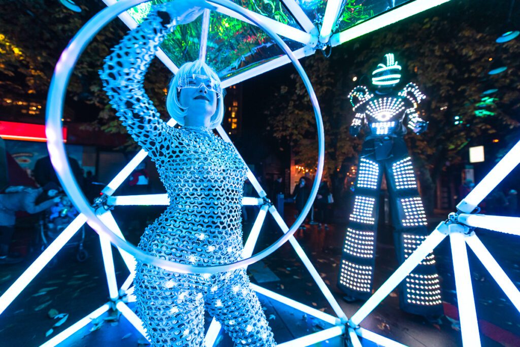 A women lighted up as a display at the Lumière Festival in Vancouver