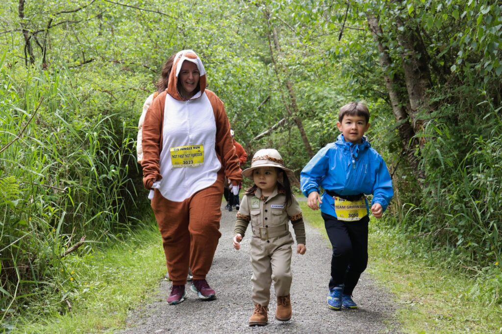 A family dressed up in costume for the Big Jungle Run for the Big Fun run series