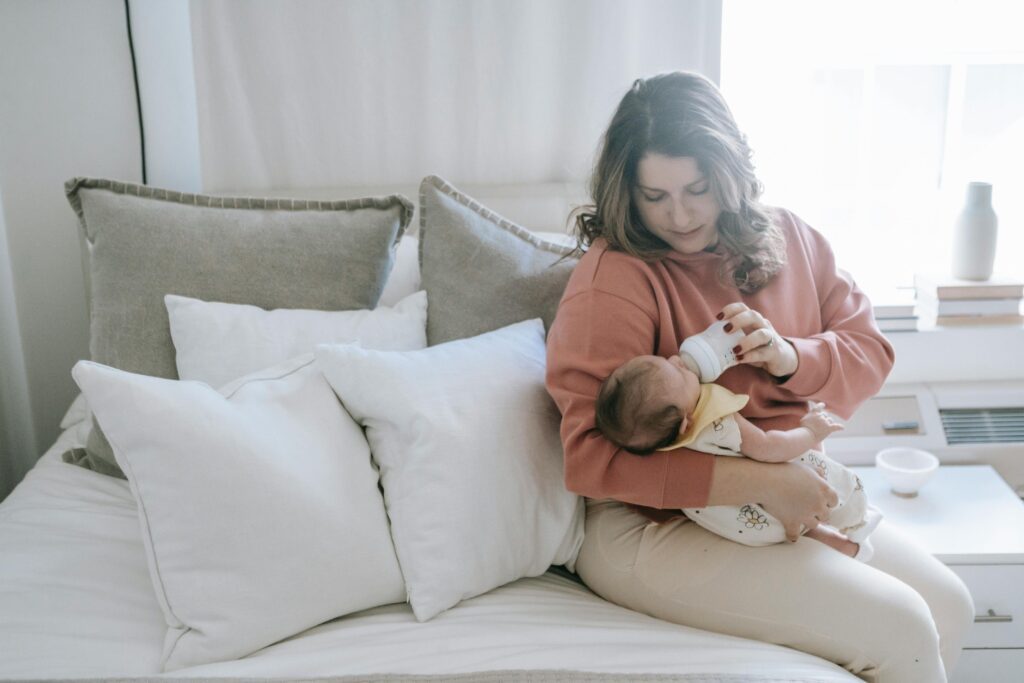Mom feeding her baby with a bottle