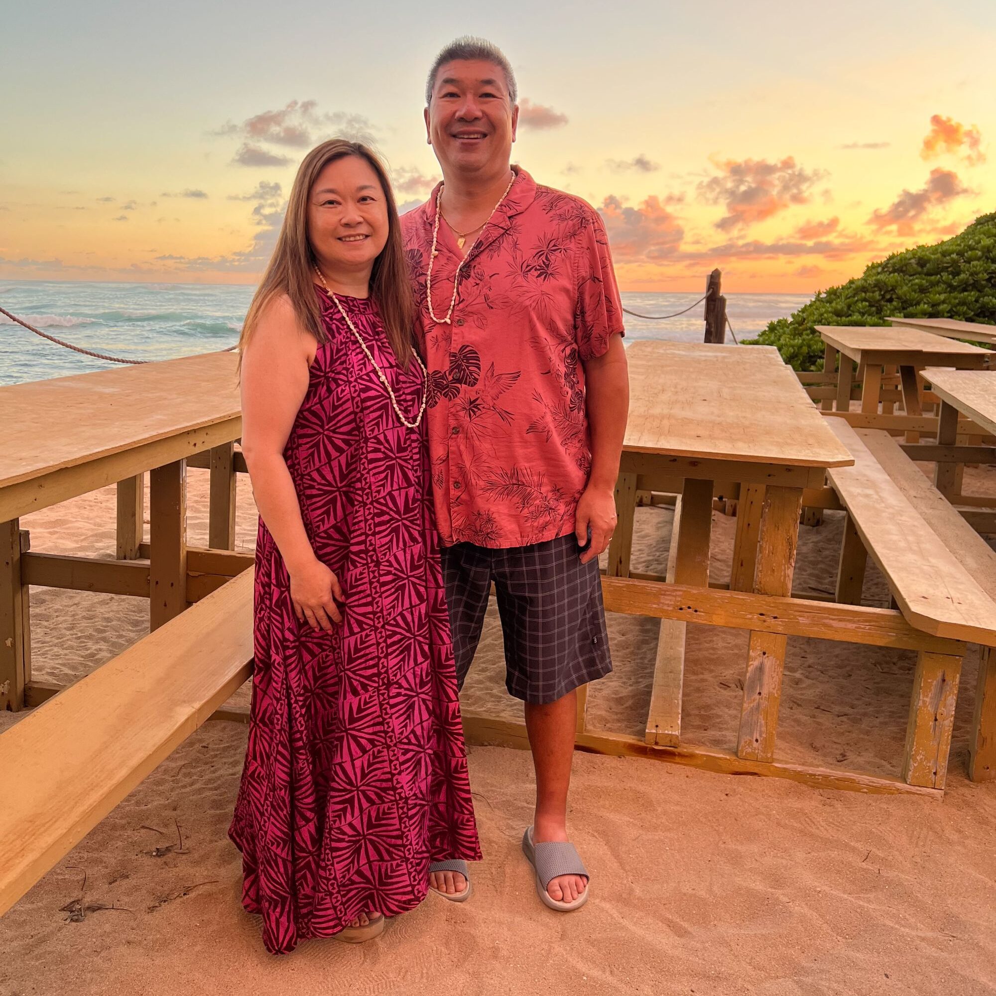 Anne Mok with her husband at a tropical island