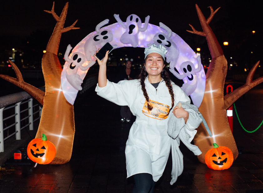 An asian lady in a costume for the Big Fun Run Halloween series. It's a great Family Fun Run!