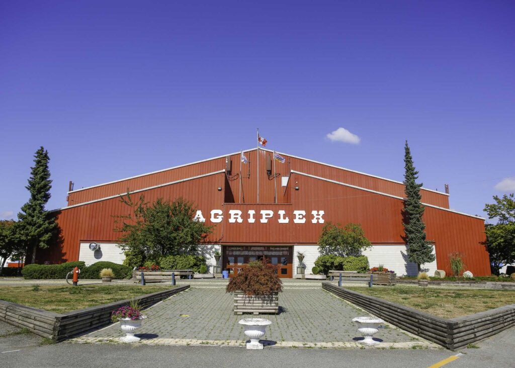 A red building called the Agriplex where one of the locations of the FIFA World Cup Fan Zones Surrey