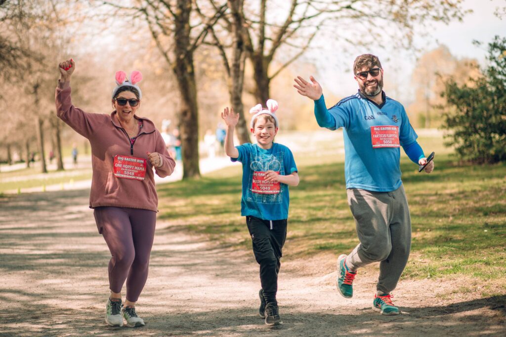 A family of 3 are running together for A family fun run in Vancouver this April for Easter Fun Run