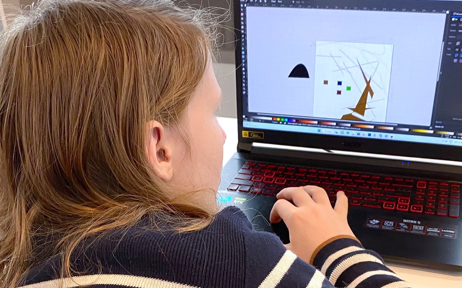 A student learning STEM on the computer for VISST Spring break camp