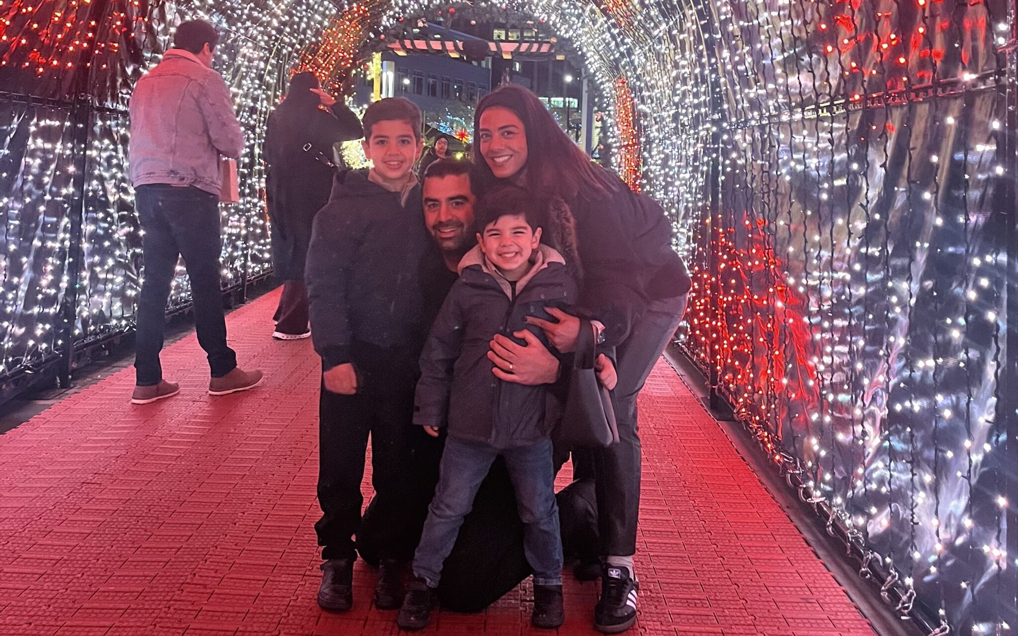 Tara Shayegan and her family at a Christmas event